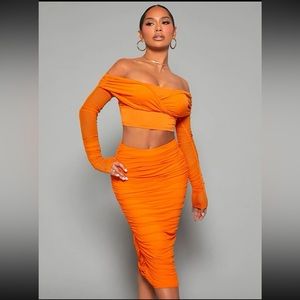 Orange off-the-shoulder two piece skirt set